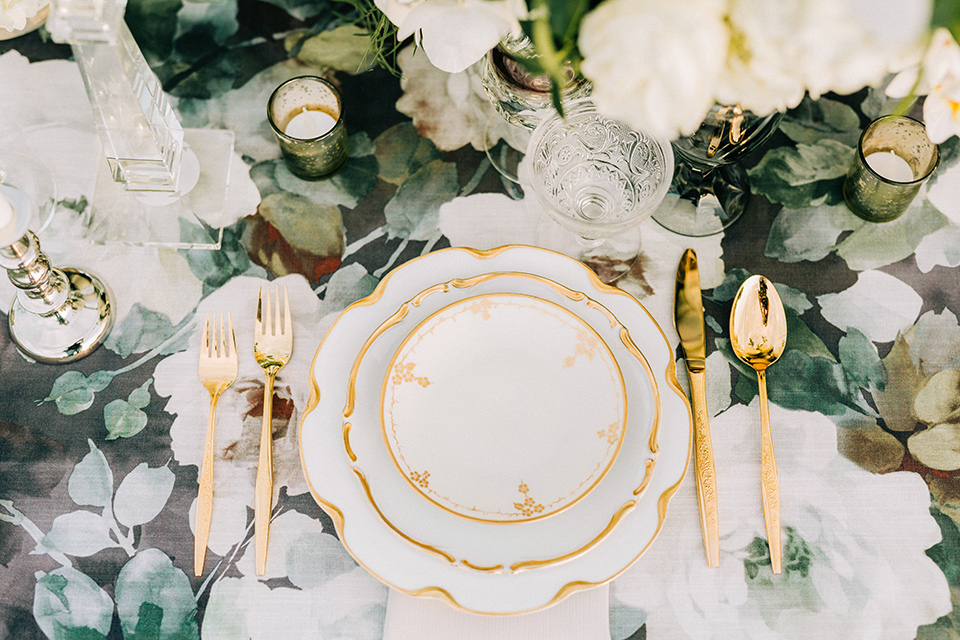  floral linen and white flatware and decor 