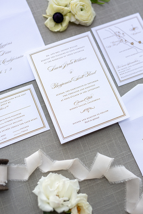  white invitations with calligraphy