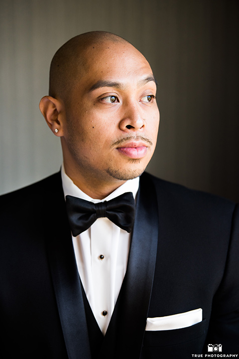 San-Diego-Wedding-groom-in-a-black-tuxedo-with-a-black-bow-tie