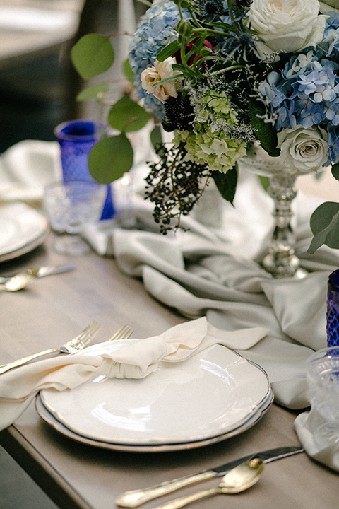 white linens with white and silver flatware