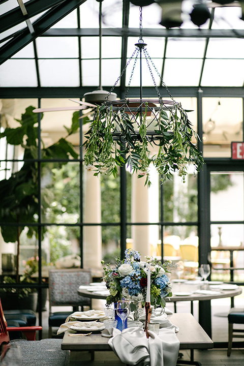 windows with hanging plants at the venue