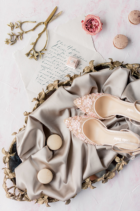 blush colored shoes with rings and pink florals