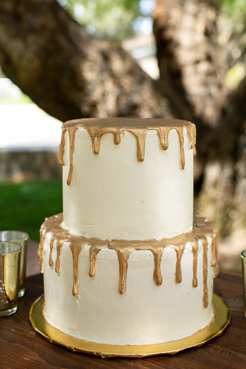 white cake with gold trim