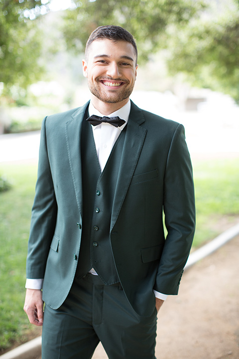  groom in a green suit