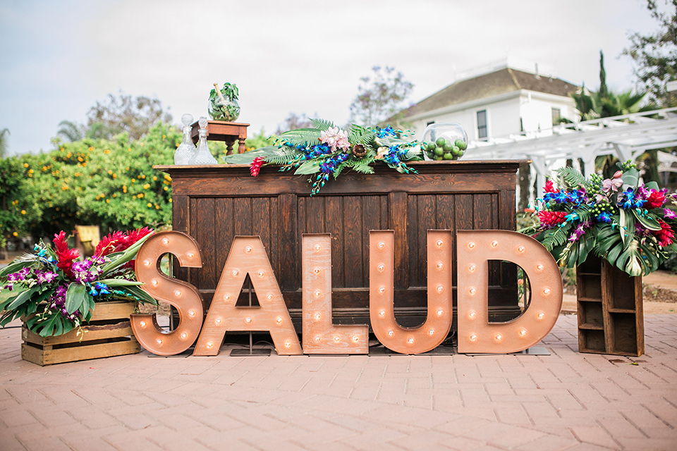 Giant Salud letters at the wedding reception 