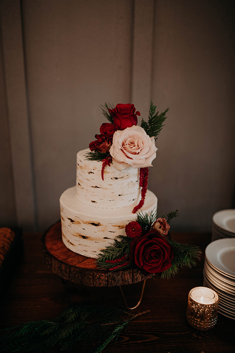 Highway-West-Vacations-cake-with-white-frosting-a-wooden-like-decor