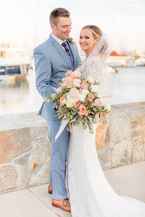 Bride and groom embrace each other in a wedding photo in San Diego 