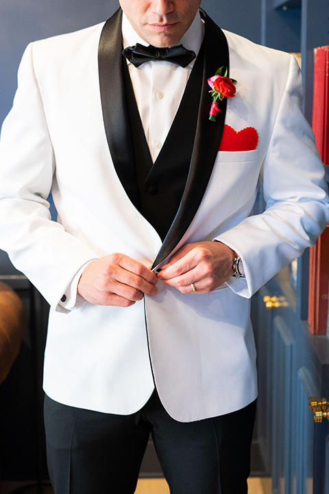 I-love-lucy-shoot-close-up-on-groom-in-a-white-and-black-tuxedo