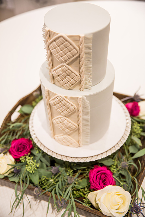 Intercontinental-elopement-shoot-cake-all-white-with-intricate-white-macrame-design