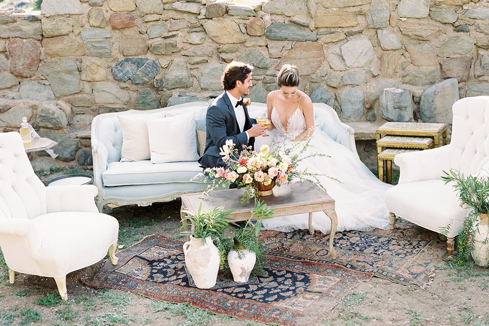 italian-style-wedding-bride-and-groom-sitting-on-couch