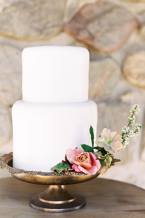 italian-style-wedding-cake-with-white-fondant-and-simple-flowers