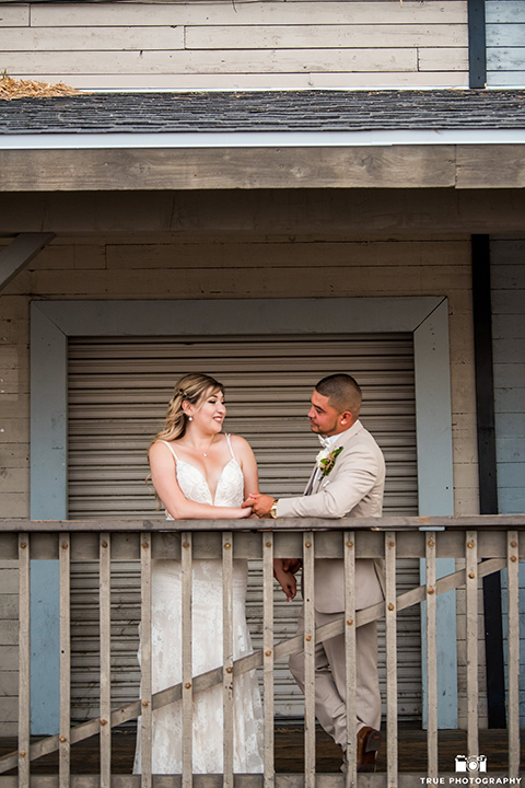 Fiesta Hall Wedding bride and groom stand under awning