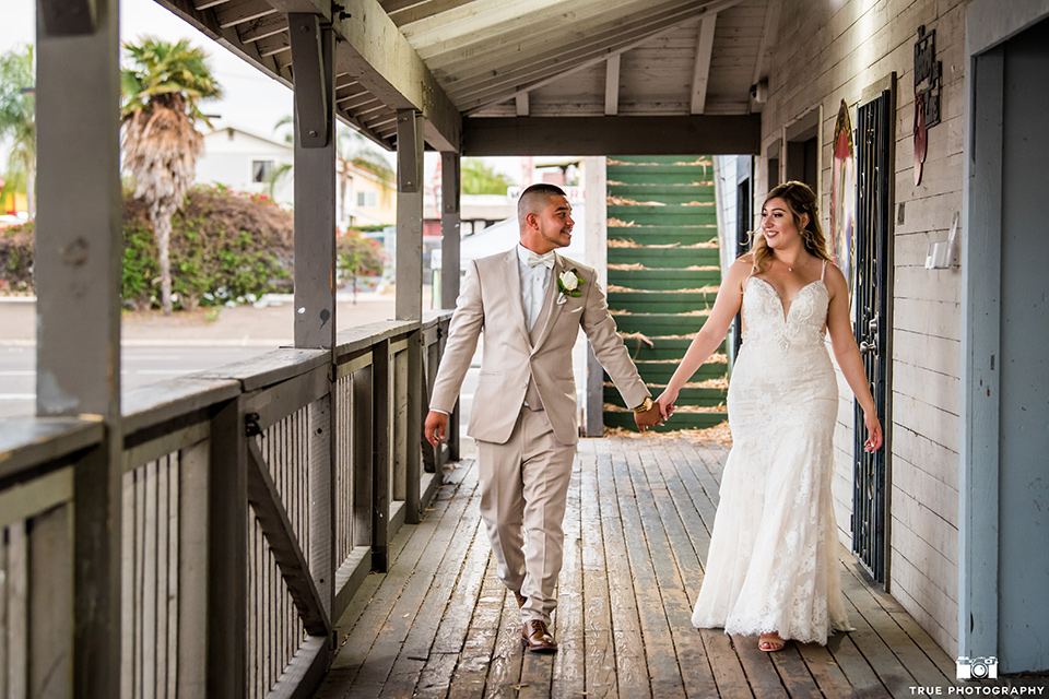 Fiesta Hall wedding bride holding hands and walking