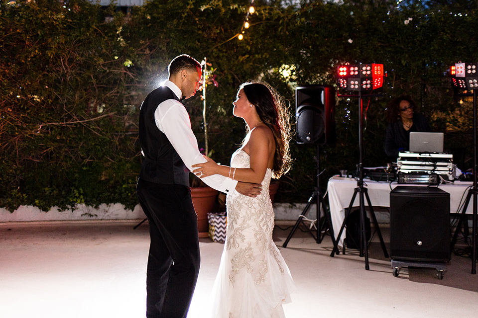 walt-disney-concert-hall-bride-and-groom-first-dance-bride-in-a-strapless-white-gown-with-a-sweetheart-neckline-groom-in-a-navy-tuxedo