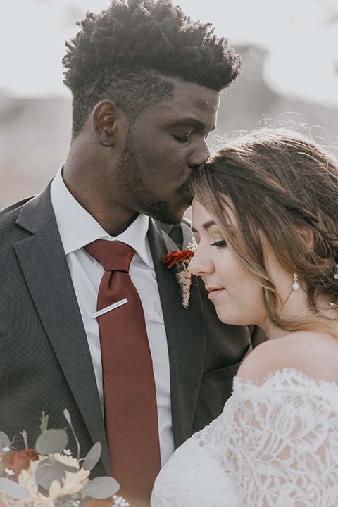 coronado-yacht-club-wedding-groom-kissing-brides-head