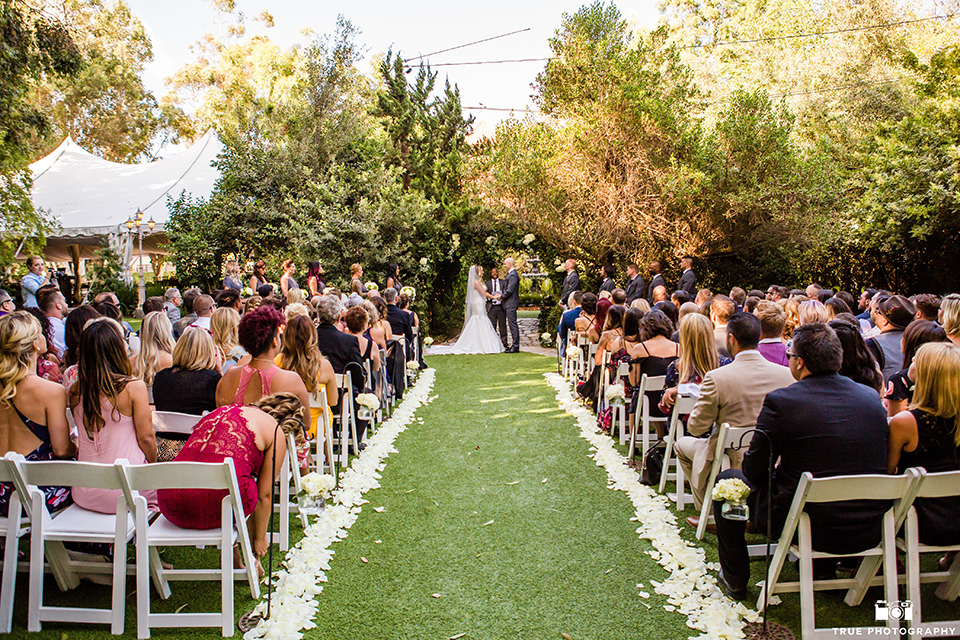 twin-oaks-weddings-ceremony-bride-in-a-strapless-fit-and-flare-gown-with-a-sweetheart-neckline-groom-in-a-charcoal-grey-suit-with-black-long-tie