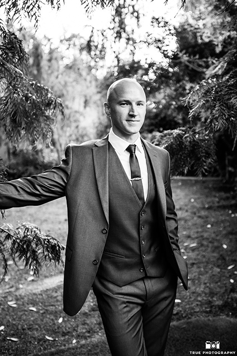 twin-oaks-weddings-groom-attire-in-a-charcoal-grey-suit-with-a-black-long-tie