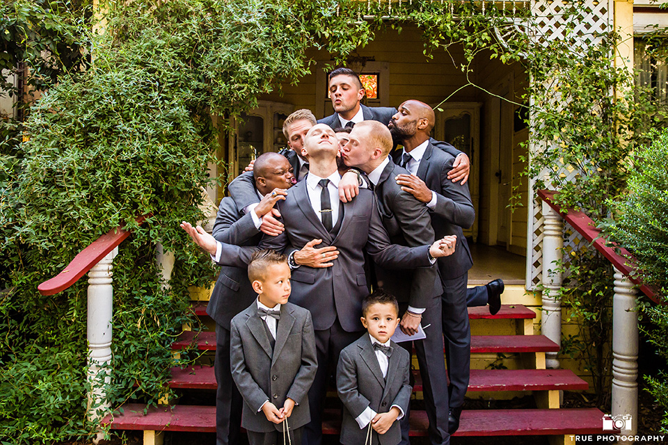 twin-oaks-weddings-groomsmen-pretending-to-kiss-groom