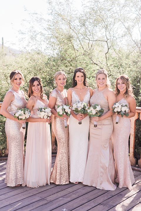 tanque-verde-ranch-arizona-wedding-bridesmaids-bride-in-a-white-formfitting-gown-bridesmaids-in-blush-toned-gowns