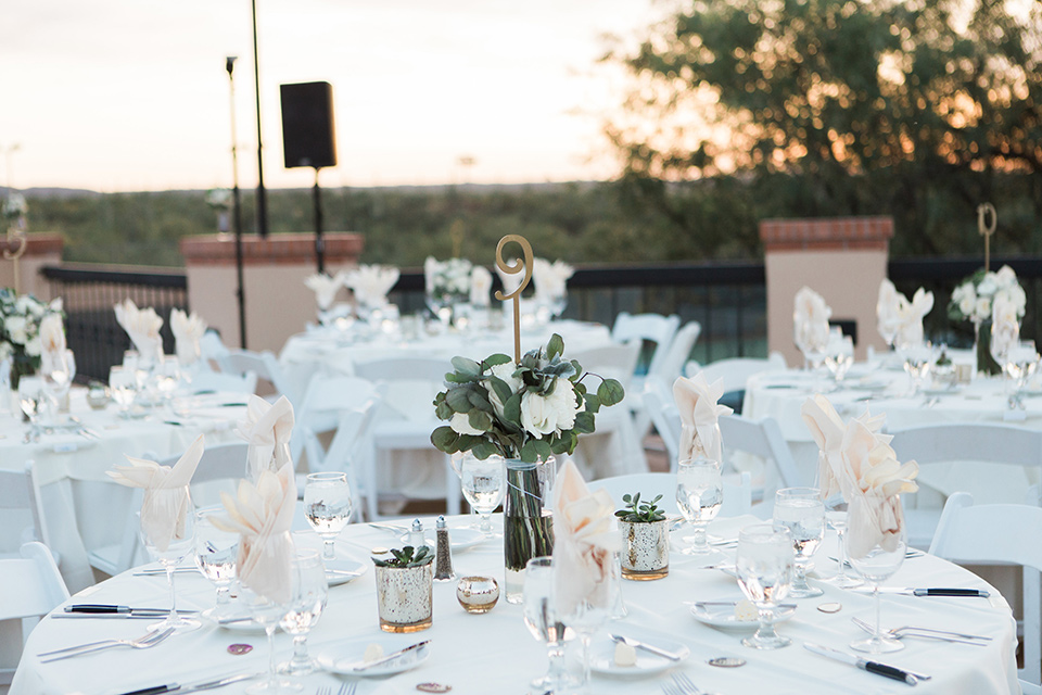 tanque-verde-ranch-arizona-wedding-table-decor-and-setup-with-white-table-linens-and-white-chairs