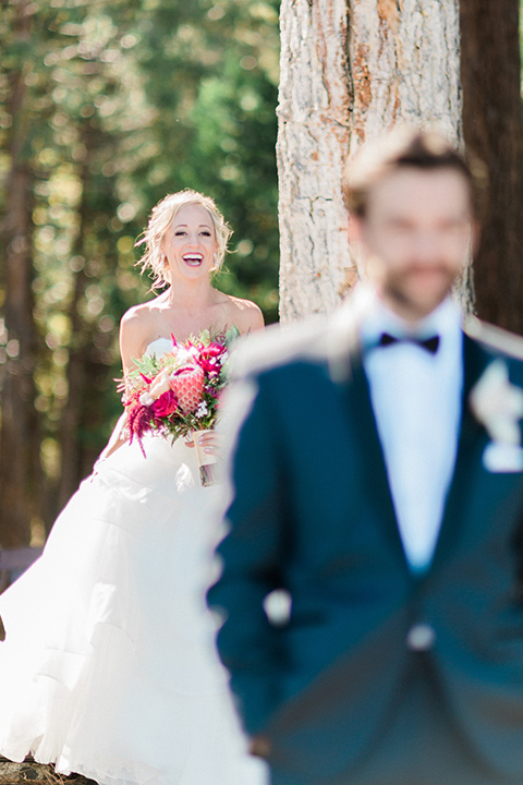 Bride laughs in a wedding photo in Lake Tahoe