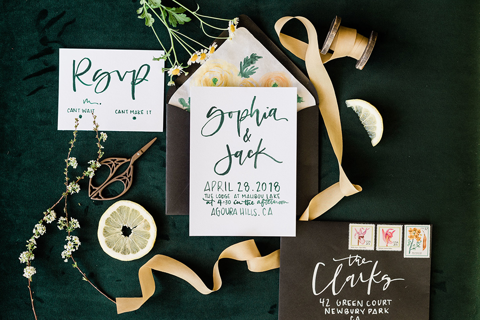 malibu-lodge-spring-wedding-shoot-invitations-with-white-paper-and-yellow-and-green-calligraphy