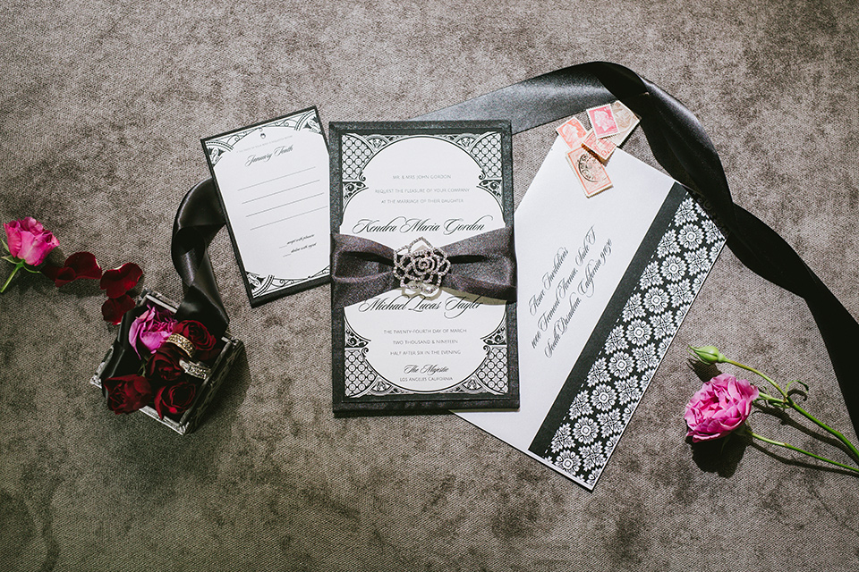 majestic-downtown-los-angeles-shoot-invitations-in-black-with-white-cursive-and-pink-floral-touches