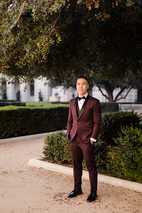 Maternity-workshop-father-alone-in-a-burgund-tux-and-black-bow-tie