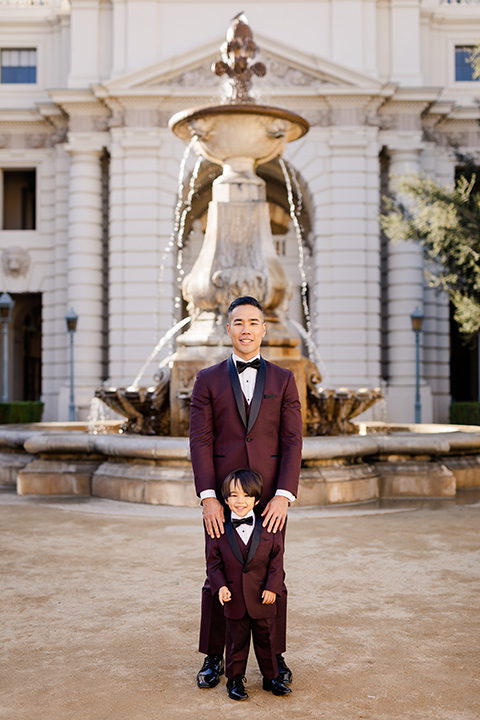Maternity-workshop-father-and-son-in-a-burgundy-tuxedos-and-black-bow-ties