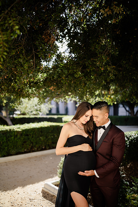 Maternity-workshop-father-alone-in-a-burgund-tux-and-black-bow-tie