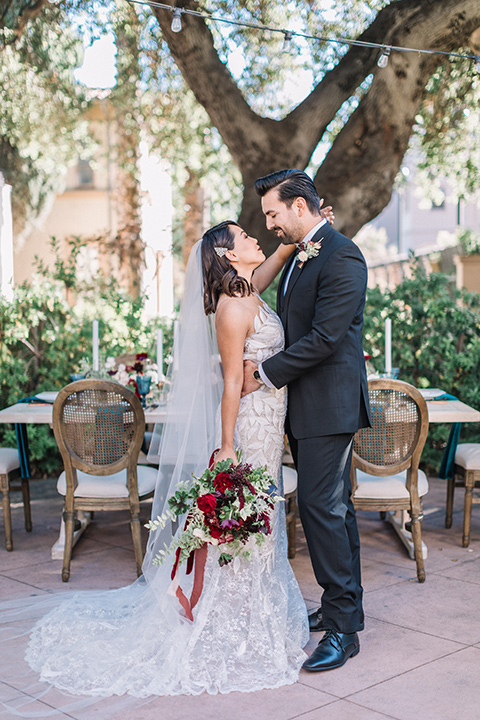 Maxwell-House-Shoot-bride-and-groom-face-to-face-bride-in-a-strapless-gown-with-an-illusion-bodice-groom-in-a-black-suit-with-long-black-tie