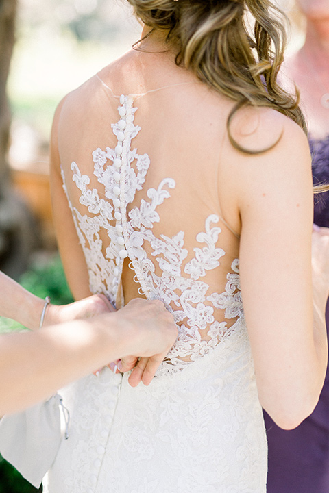 Temecula-Creek-Inn-Wedding-back-of-brides-dress-with-an-illusion-back-with-lace