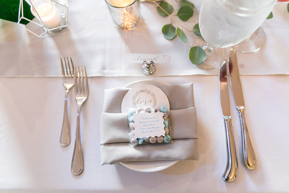 ivory and white everything with silver flatware 