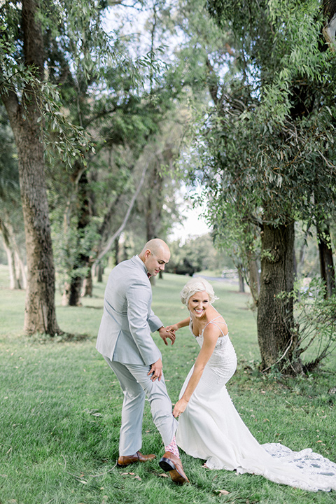 bride and groom posing for a picture