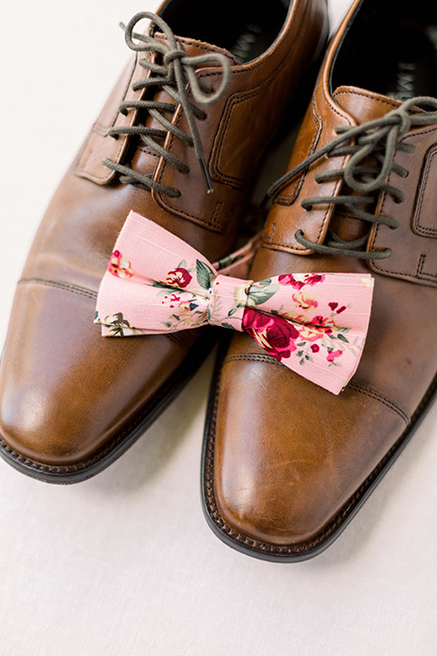 men's brown dress shoes with floral bow tie