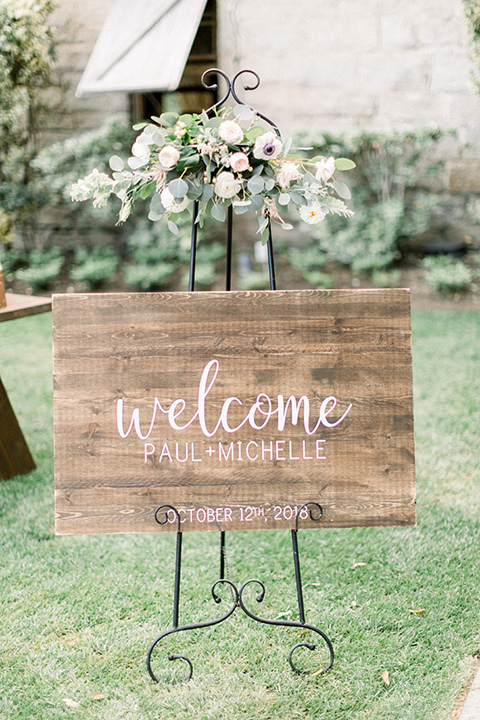 Temecula creek inn wedding welcome sign at ceremony