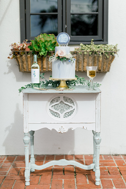  white vintage table with desserts on them 