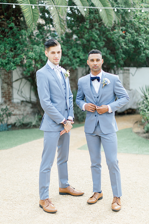  groomsmen in light blue suits 