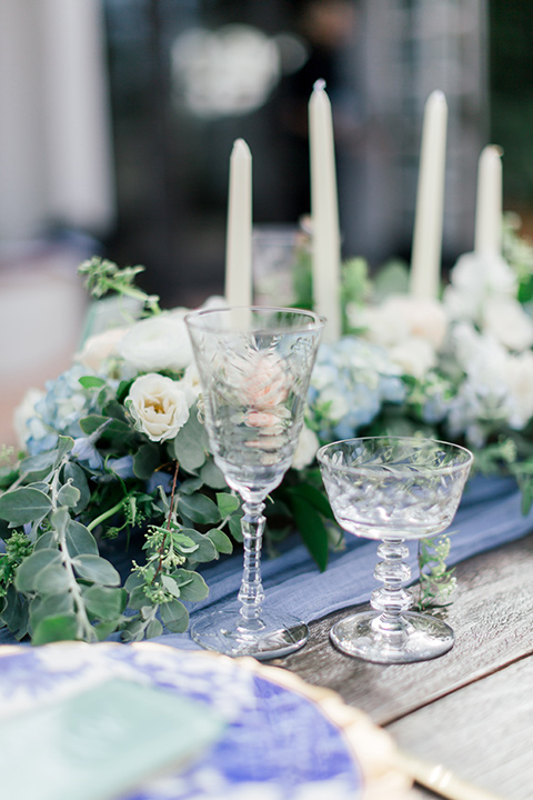  white candles and blue decor 