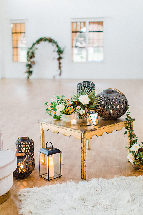 modern Moroccan shoot gold tables and green florals