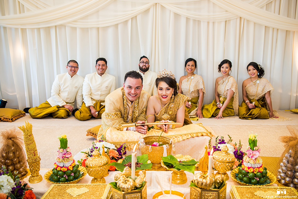 bride and groom and their bridal party in their cultural attire