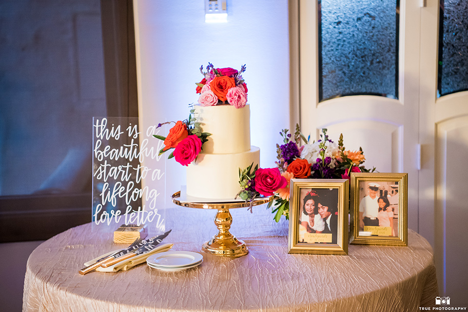 white cake and dessert table