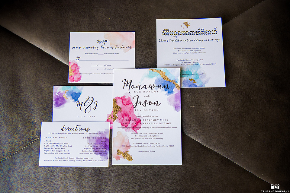 white invitations and water color design