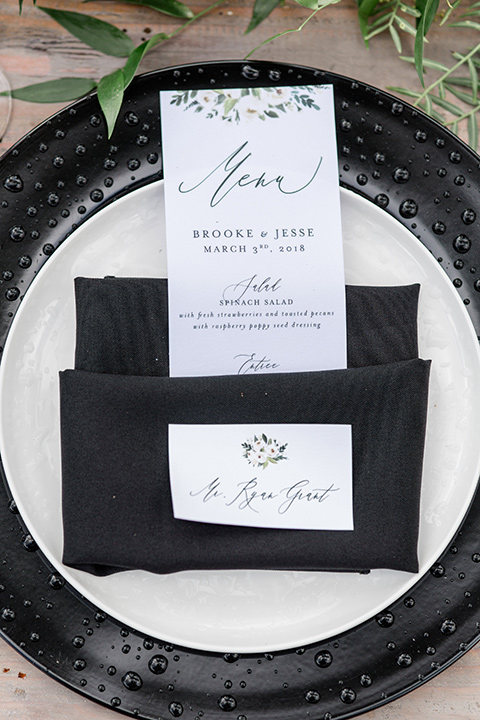 Oak-Meadows-Shoot-table-flatware-and-linens-with-black-charger-plates-and-white-menu-cards