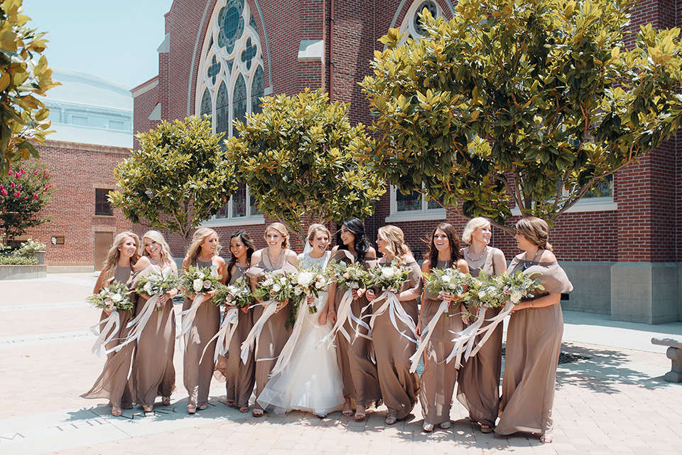 orange-county-wedding-bridesmaids-in-a-taupe-colored-dress-bride-in-a-two-piece-ball-gown-with-lace-detailing