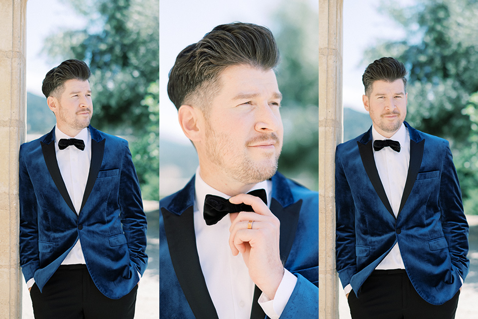 groom in a blue velvet tuxedo and black bow tie