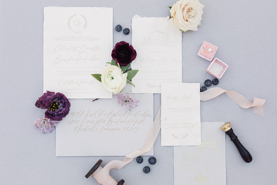 rancho-las-lomas-wedding-invitations-on-white-paper-and-purple-calligraphy