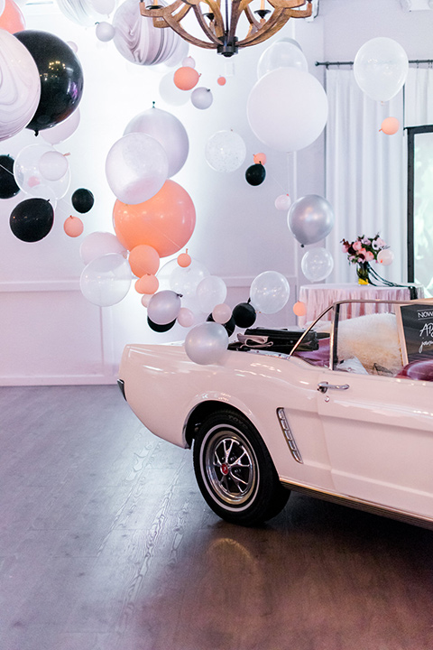 rock-n-roll-wedding-style-car-with-balloons