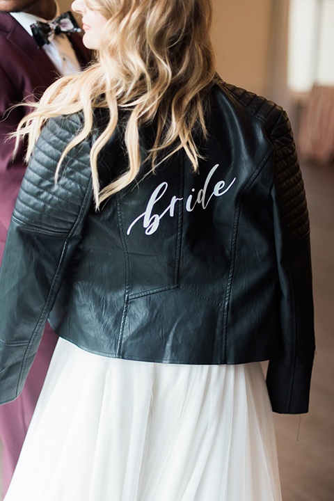 rock-n-roll-wedding-style-leather-jacket-with-white-bride-calligraphy