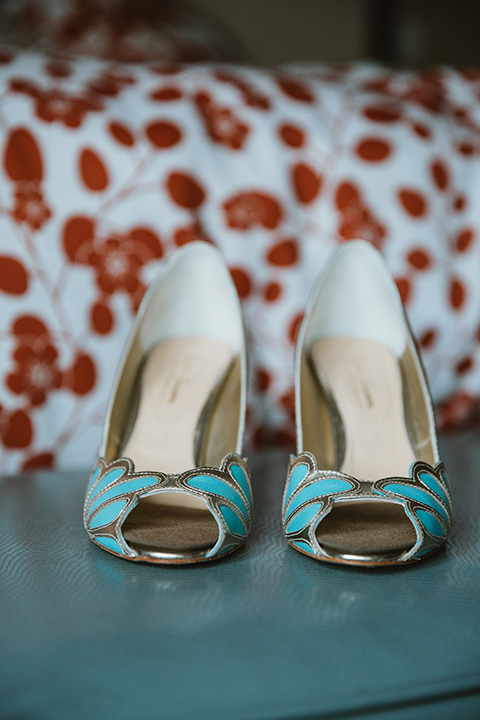 Moniker-Warehouse-Wedding-brides-shoes-with-teal-blue-accents